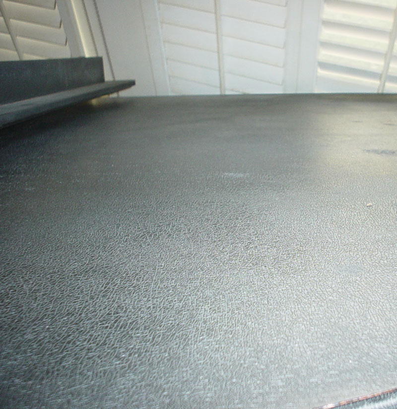 Piano lid is faded.